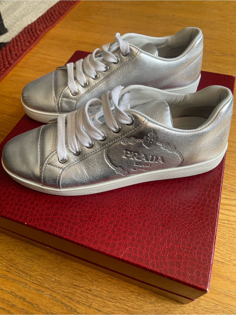 Prada | Embossed Metallic Sneakers in Silver